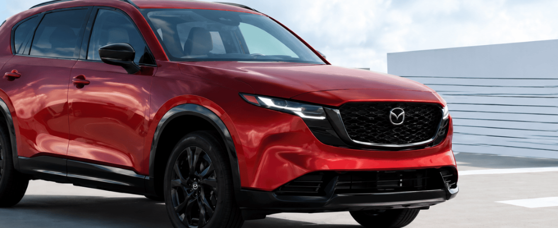 Row of new Mazda SUVs on the lot at Bright Bay Mazda in Bay Shore, NY, serving Mazda SUV shoppers across Long Island