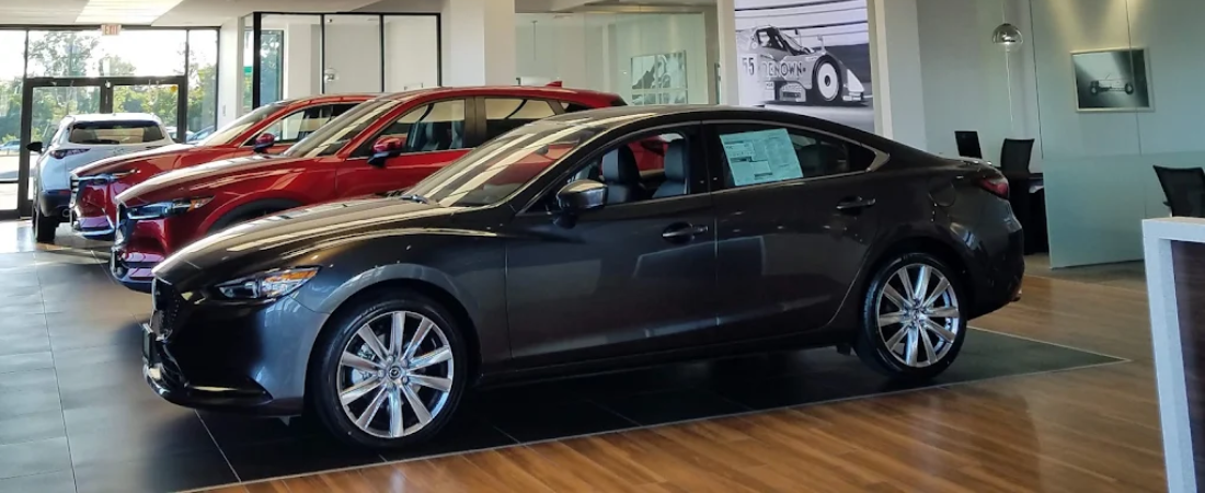 Inside Bright Bay Mazda's Bay Shore, NY showroom — helping shoppers weigh the dealership and the Mazda lineup together